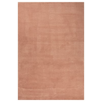 A beige STOENSE rug with a soft, dense pile and subtle sheen. Its rectangular and made of polypropylene and synthetic rubber.