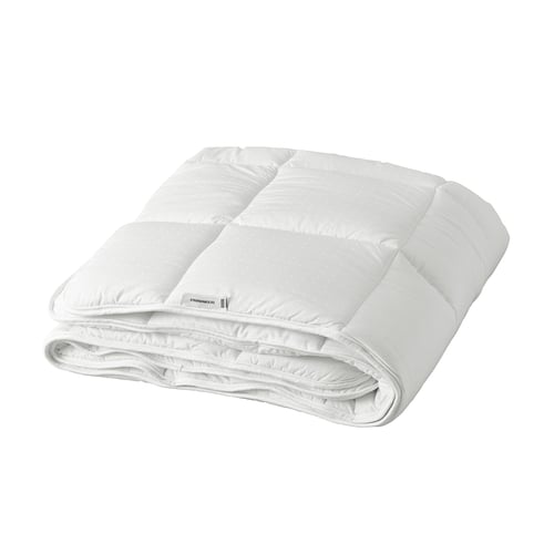 Folded white STRANDMOLKE duvet, extra warm, lightweight, with soft cotton and recycled polyester hollow fibre filling, neatly stitched, luxury design.