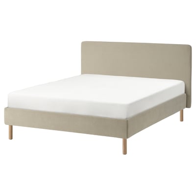 Modern beige fabric bed with wooden legs, soft headboard, clean lines.