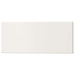 Displays a rectangular white UTRUSTA drawer front made of acrylic-painted fiberboard.