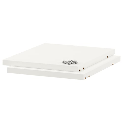 Two white ikea UTRUSTA melamine shelves, thick and sturdy, ready for assembly.