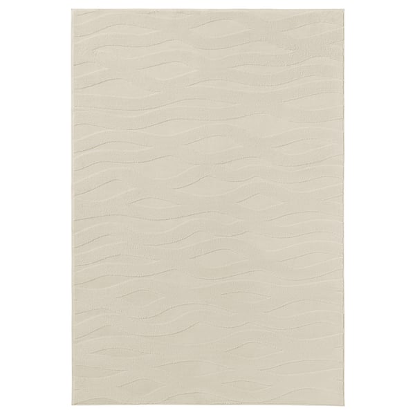 VÄXELFEL rug: light beige, soft polyester, rectangular, wavy 3d pattern.
