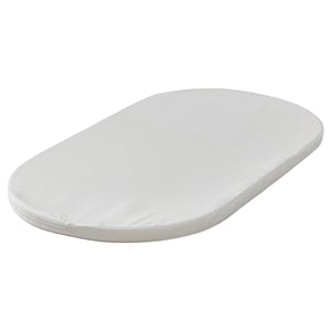 A white ÄLSKVÄRD baby mattress, oval-shaped with a smooth, simple design, perfect for a bassinet.