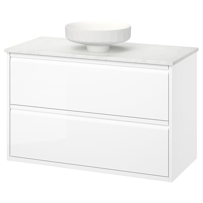 Modern white bathroom cabinet with marble countertop and round basin.