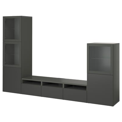 Modern dark grey BESTÅ tv stand and cabinet combo with sleek, smooth surfaces and glass doors, offering ample storage.
