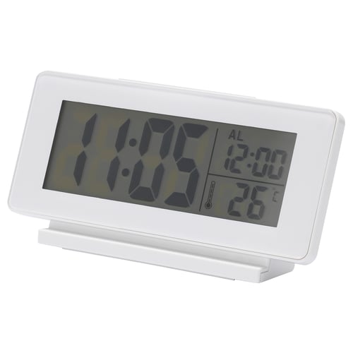 A white FILMIS led alarm clock with a rectangular design, displaying time 11:05, alarm set for 12:00, and temperature 25°c.