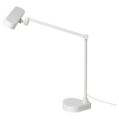 A white LÄKTRA desk lamp with an adjustable arm, suitable for studying or working.