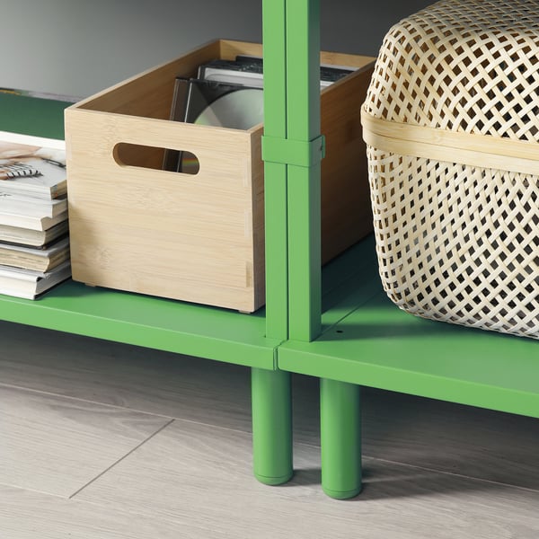 Bright green LÄTTHET legs elevate platsa storage, keeping it neat and easy to clean under floor.