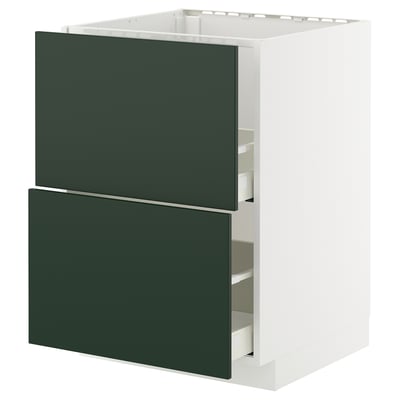 A white METOD kitchen cabinet with two dark green drawers. It has a modern design and is equipped with smooth-running drawers.