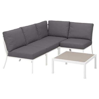 Modern outdoor sofa set with grey cushions, white metal frames, and a matching coffee table.