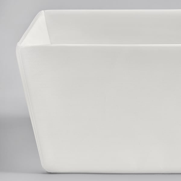 White fabric storage box, clean and organised, made from recycled materials.