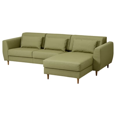 Modern olive-green l-shaped sofa, wooden legs, plush cushions, compact design.