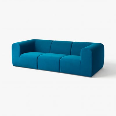 Blue modern sofa with boxy design, teal velvet fabric.