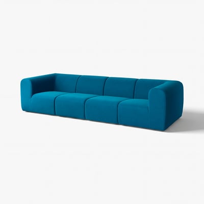 Modern blue velvet sofa, boxy shape, deep seat, plush cushions.