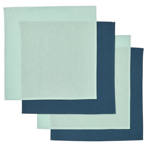 Three green-blue SVARTSENAP cotton napkins, neatly stacked in varying shades of green and blue, displaying a woven pattern.