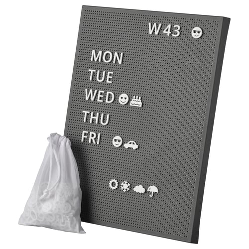 Black SVENSÅS pegboard with white letters and symbols, includes storage bag. Displays days and weather icons.