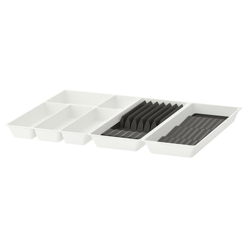 A white UPPDATERA kitchen organiser, including a cutlery tray and a knife rack made of recycled polypropylene plastic.