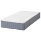 Blue IKEA mattress, rectangular, with white quilted top, foam and spring layers, firm support.
