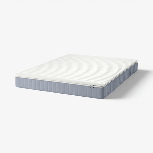 White mattress of IKEA, VESTERÖY, rectangular, pocket sprung, foam top, recycled fabric.