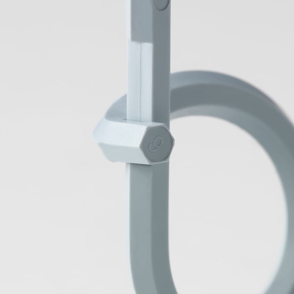 Close-up of durable, light blue cable tie with adjustable locking mechanism for securing cords.