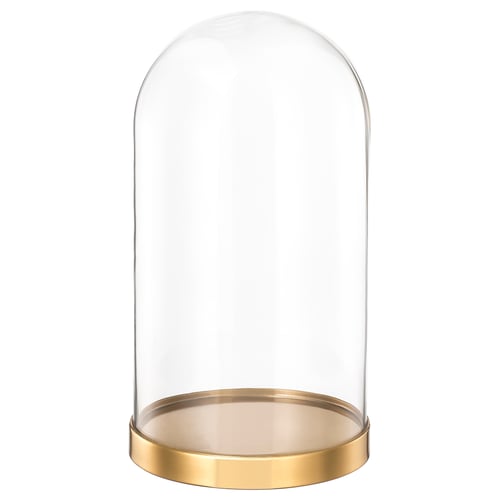 Clear glass dome on gold base, displays items.