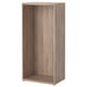 An IKEA BESTÅ storage unit in light brown, made of particleboard and fibreboard. Its rectangular with four adjustable feet and no shelves or doors.