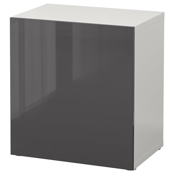 An IKEA BESTÅ storage unit, grey and white, with a glossy finish, square shape, and minimalist design.