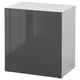 An IKEA BESTÅ storage unit, grey and white, with a glossy finish, square shape, and minimalist design.