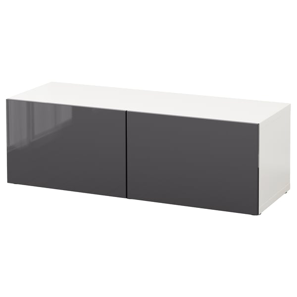 Displays a white and grey rectangular storage unit, part of the BESTÅ series. It a sleek design with two grey doors.