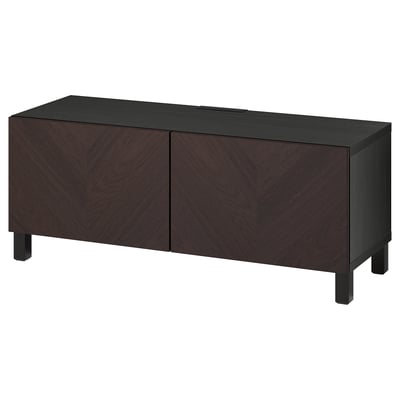Dark brown wooden tv stand with two doors, featuring a chevron pattern and adjustable shelves, designed to organise electronics.