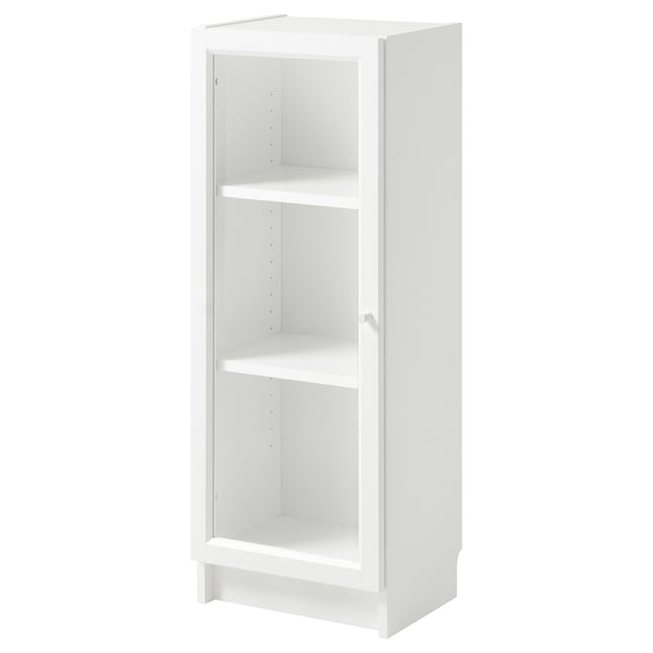 A white BILLY bookcase with glass doors, standing tall and slim, perfect for small spaces.