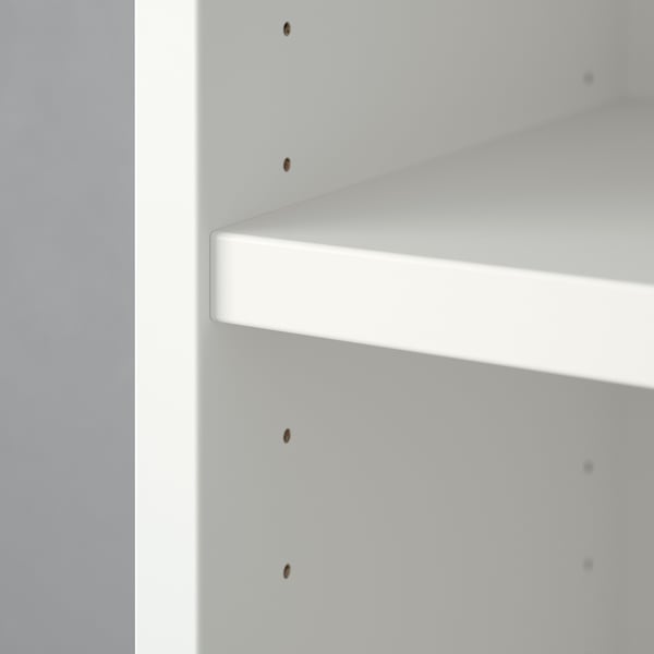 White BILLY bookshelf, clean and minimalist design, with two empty shelves.