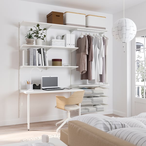 BOAXEL storage in bedroom with shelves, desk, and bed.