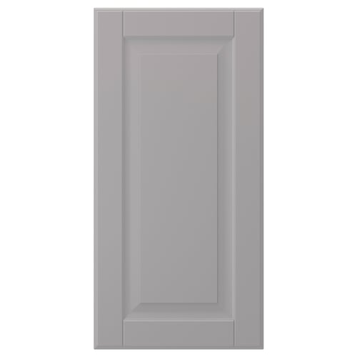 A grey BODBYN cabinet door. It has a smooth, rectangular shape with a bevelled panel design and a lacquered finish.