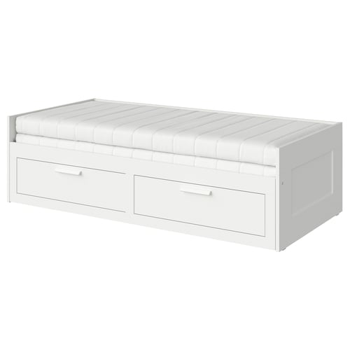 A white BRIMNES day-bed with two drawers, featuring a foam mattress for comfort. Its great for small spaces, converting from a sofa to a bed.