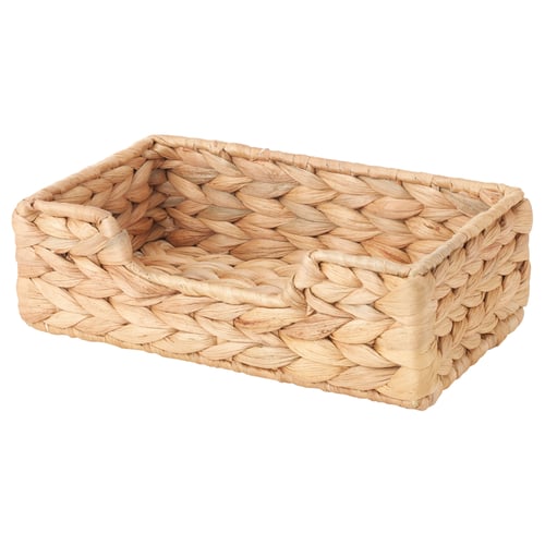 A handwoven water hyacinth napkin holder. Its rectangular shape has a natural, earthy colour and intricate braided design.