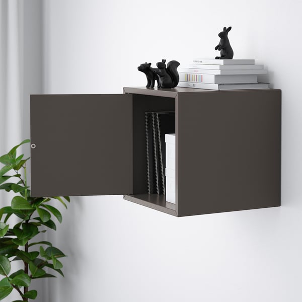 Open wall-mounted storage with decorative items on top, internal shelves visible.