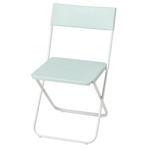 Light green folding chair, white metal frame, slim design, ideal for small spaces.