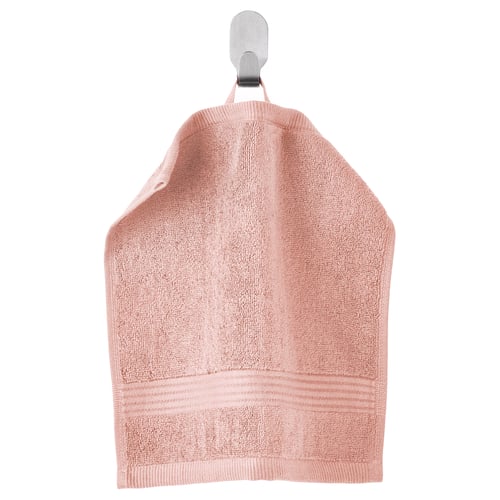 Pink FREDRIKSJÖN cotton towel hangs on hook, soft with textured border.