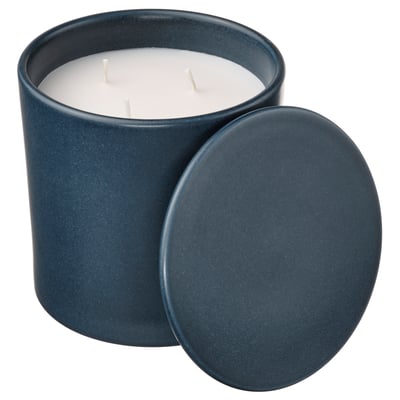 Blue ceramic candle jar with lid, three unlit wicks, rustic outdoor scent, suitable for home decor.