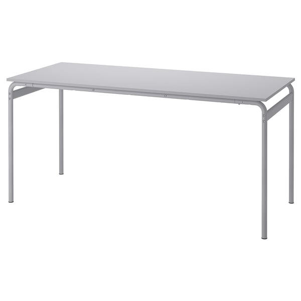 Grey metal table with melamine top, versatile for dining & working.