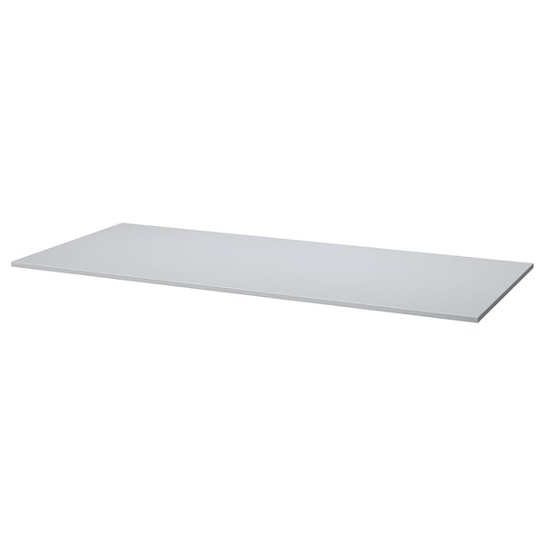 A GRÅSALA tabletop. Its light grey, rectangular, and made of particleboard with melamine foil and plastic edging.