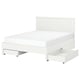A white GULLABERG bed with a wooden headboard and 4 drawers on castors beneath it, offering storage.