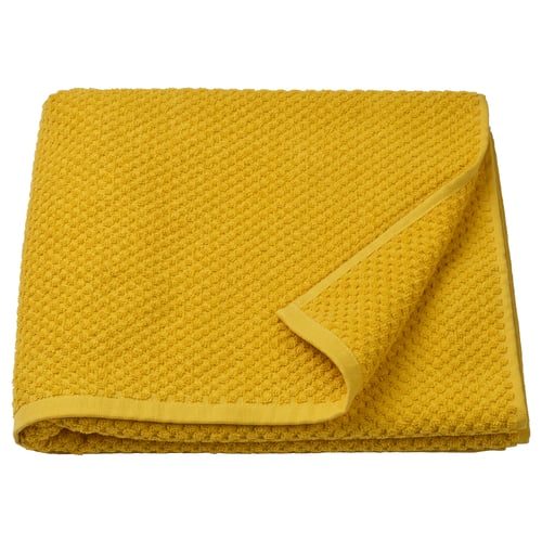 Bright yellow GULVIAL towel, folded, soft 100% cotton, thick, textured surface.