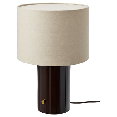 A HALGATT lamp with a black base and beige linen shade, featuring a sleek and modern design.