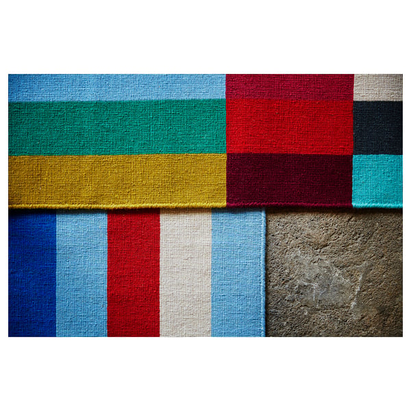 HALVED rug: colourful, rectangular, handwoven wool, geometric pattern.