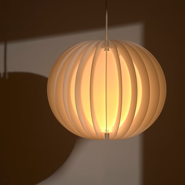 Ribbed hanging lamp with warm glow, 1979 design by bent boysen, flat-pack shade.