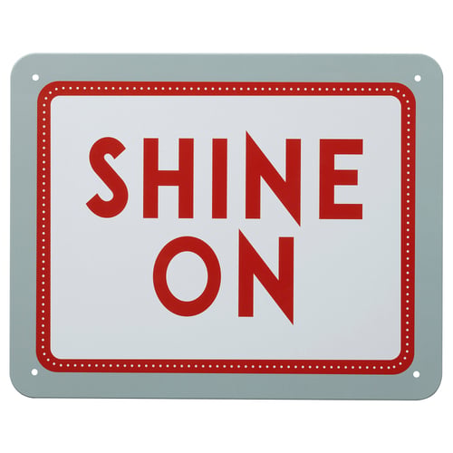 Sign reads shine on in red within a dotted red border on light blue background. Rectangular shape, metal material.