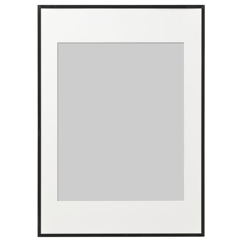 A LOMVIKEN picture frame in black with a slim metal edge, featuring a safe plastic front protection designed to display loved photos.