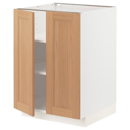 An open METOD kitchen cabinet with light oak doors. It two adjustable shelves and a sturdy white base.